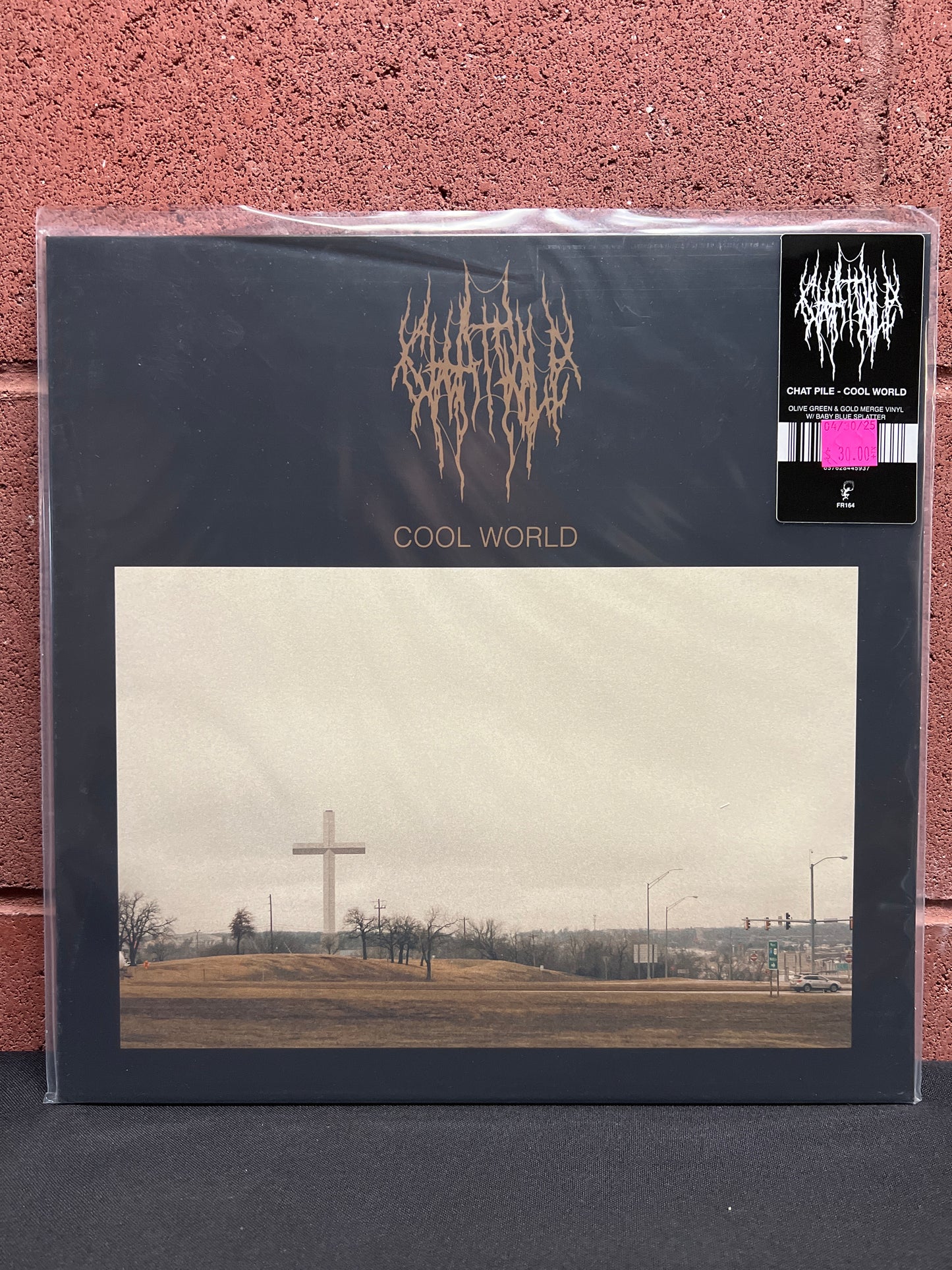 Used Vinyl: Chat Pile "Cool World" LP (Olive Green and Gold Merge with Baby Blue Splatter Vinyl)