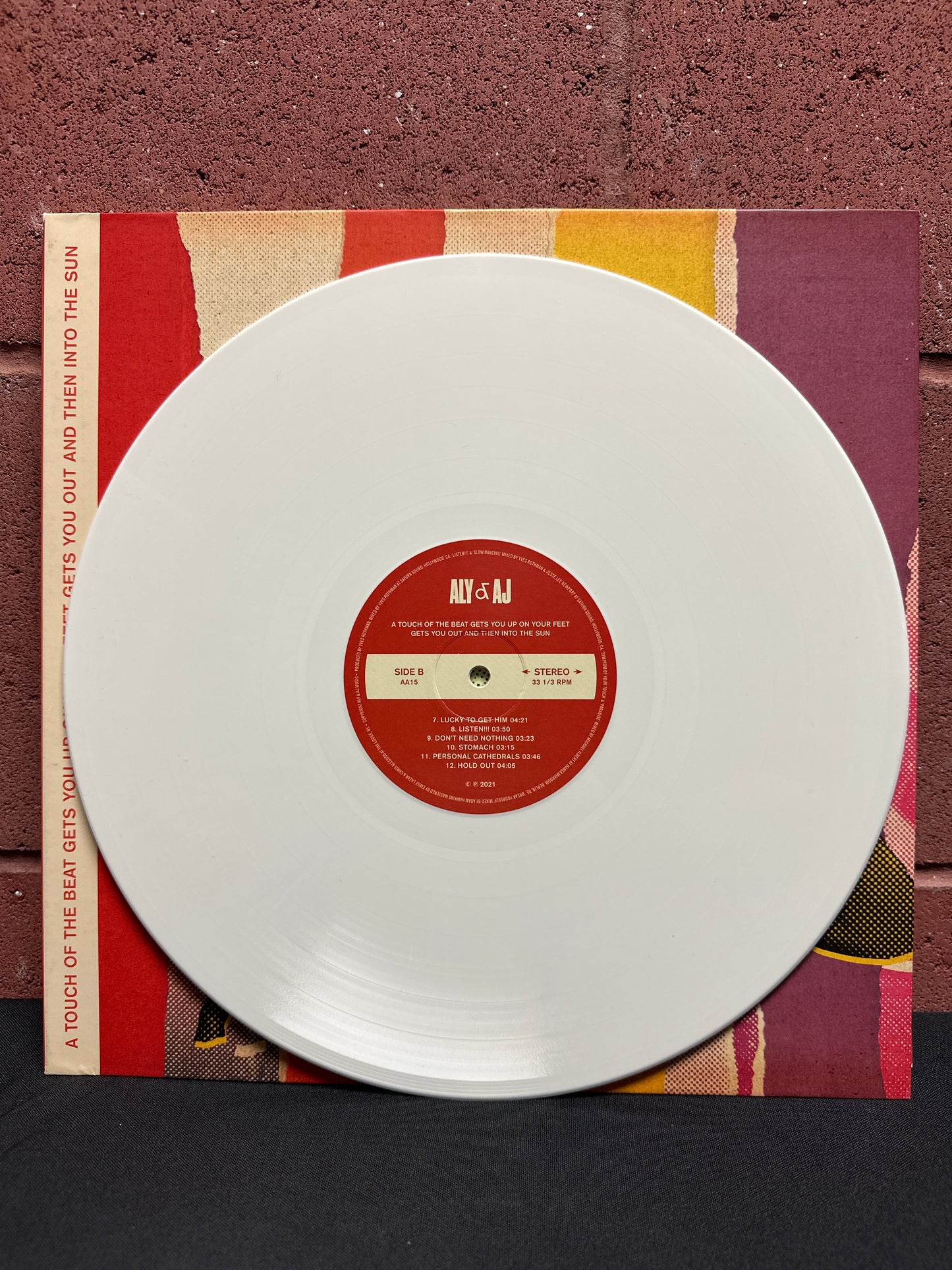 Used Vinyl: Aly & AJ ”A Touch Of The Beat Gets You Up On Your Feet Gets You Out And Then Into The Sun” LP (Cream vinyl)