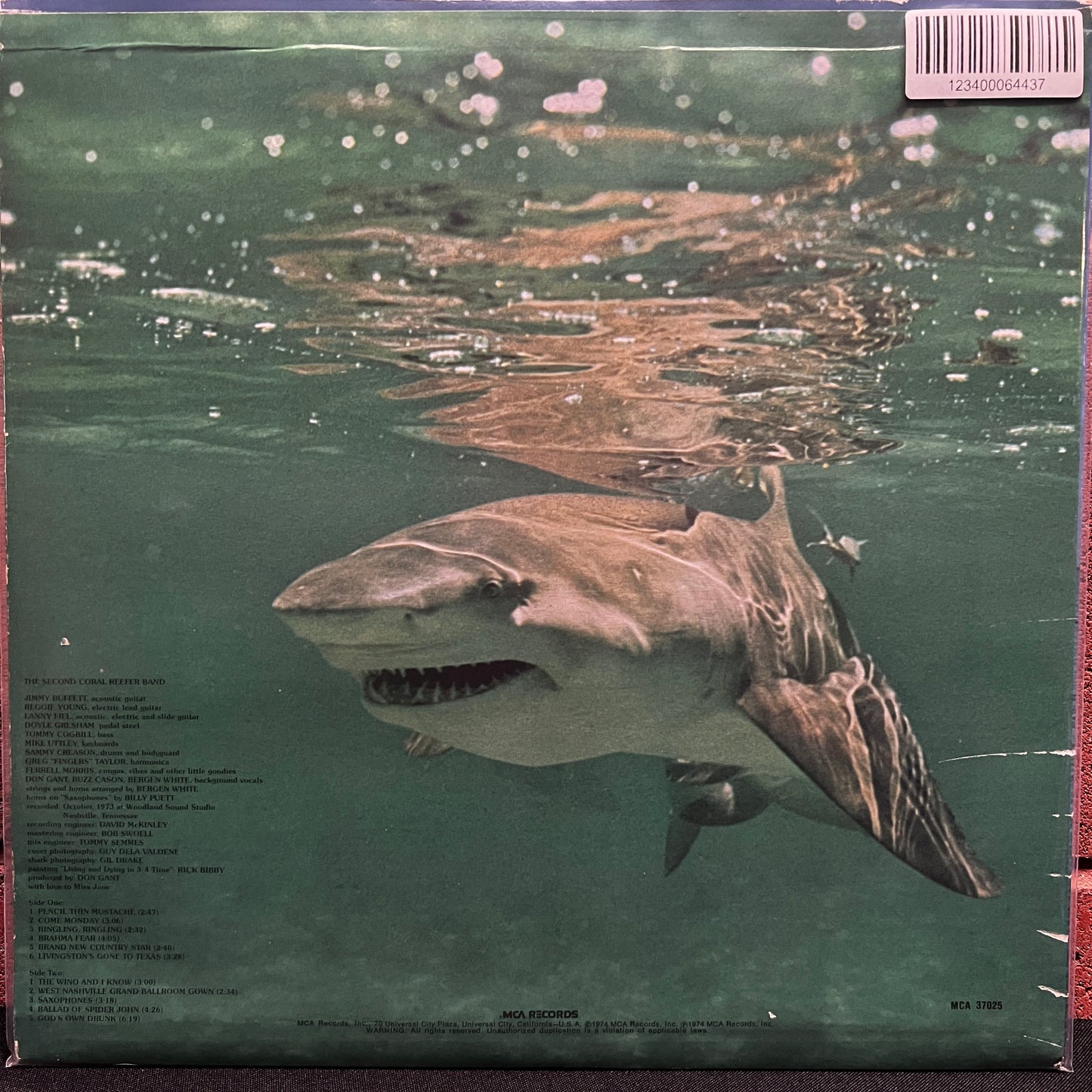 Used Vinyl: Jimmy Buffett "Living And Dying In 3/4 Time" LP (1980 Press)