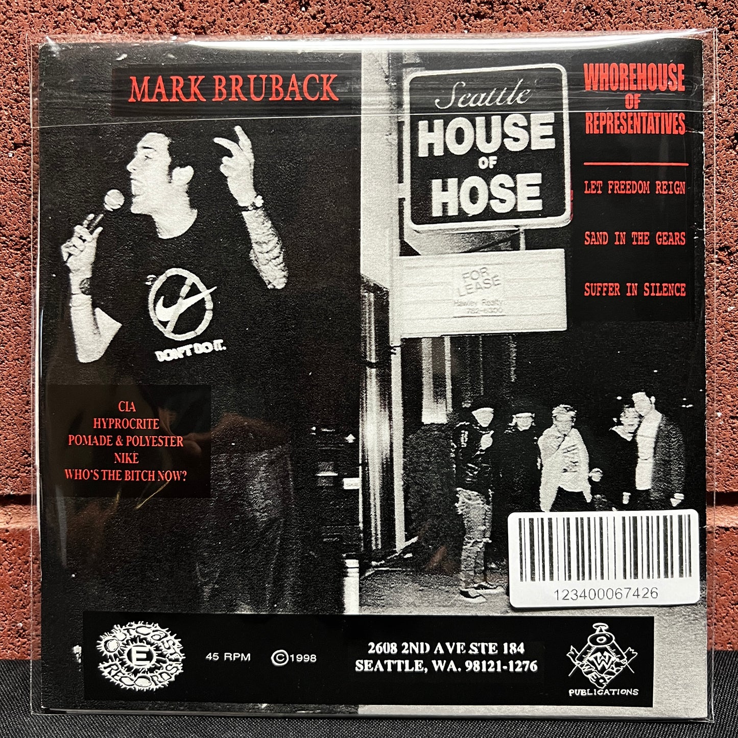 Used Vinyl: Mark Bruback / Whorehouse Of Representatives "Burn Down Nike Town" 7" (1998 Press)