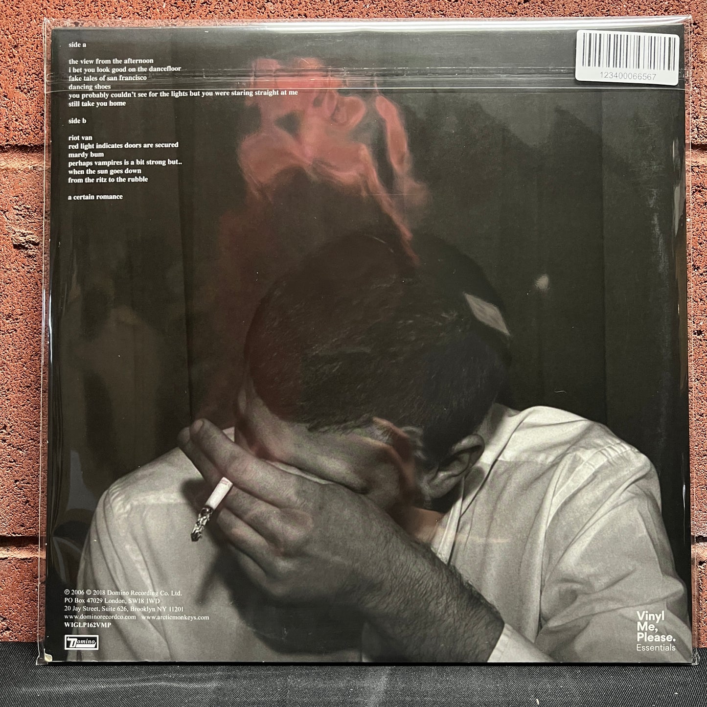 Used Vinyl: Arctic Monkeys "Whatever People Say I Am, That's What I'm Not" LP (2018 Press - Grey w/Black Smoke Vinyl)