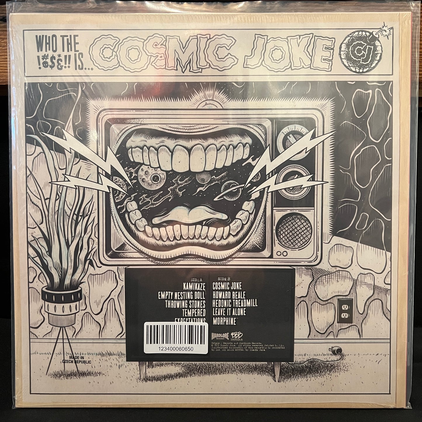 Used Vinyl: Cosmic Joke "Who The !?!&!!" LP (Clear w/Green & Blue Splatter Vinyl)