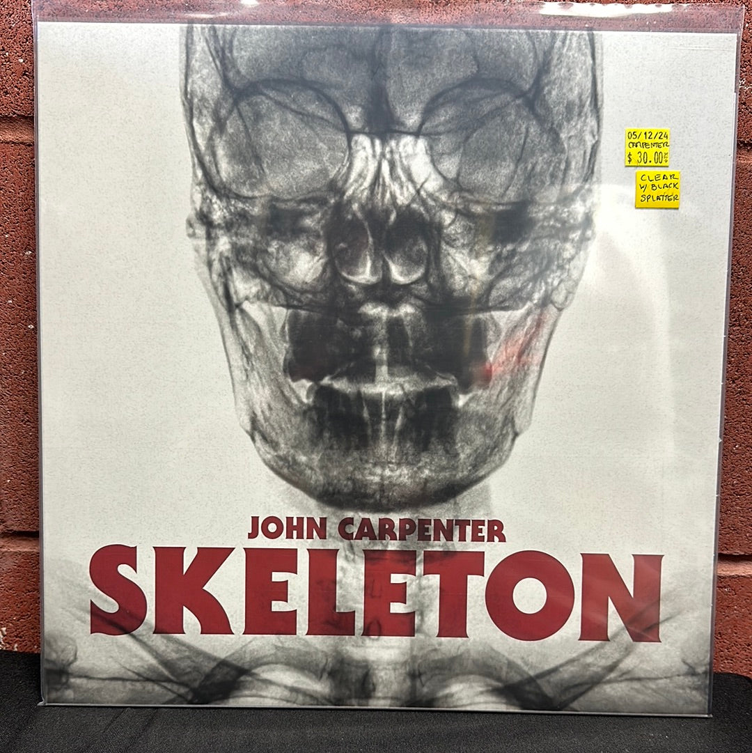 Used Vinyl: John Carpenter "Skeleton" 12" (Clear with black splatter vinyl)