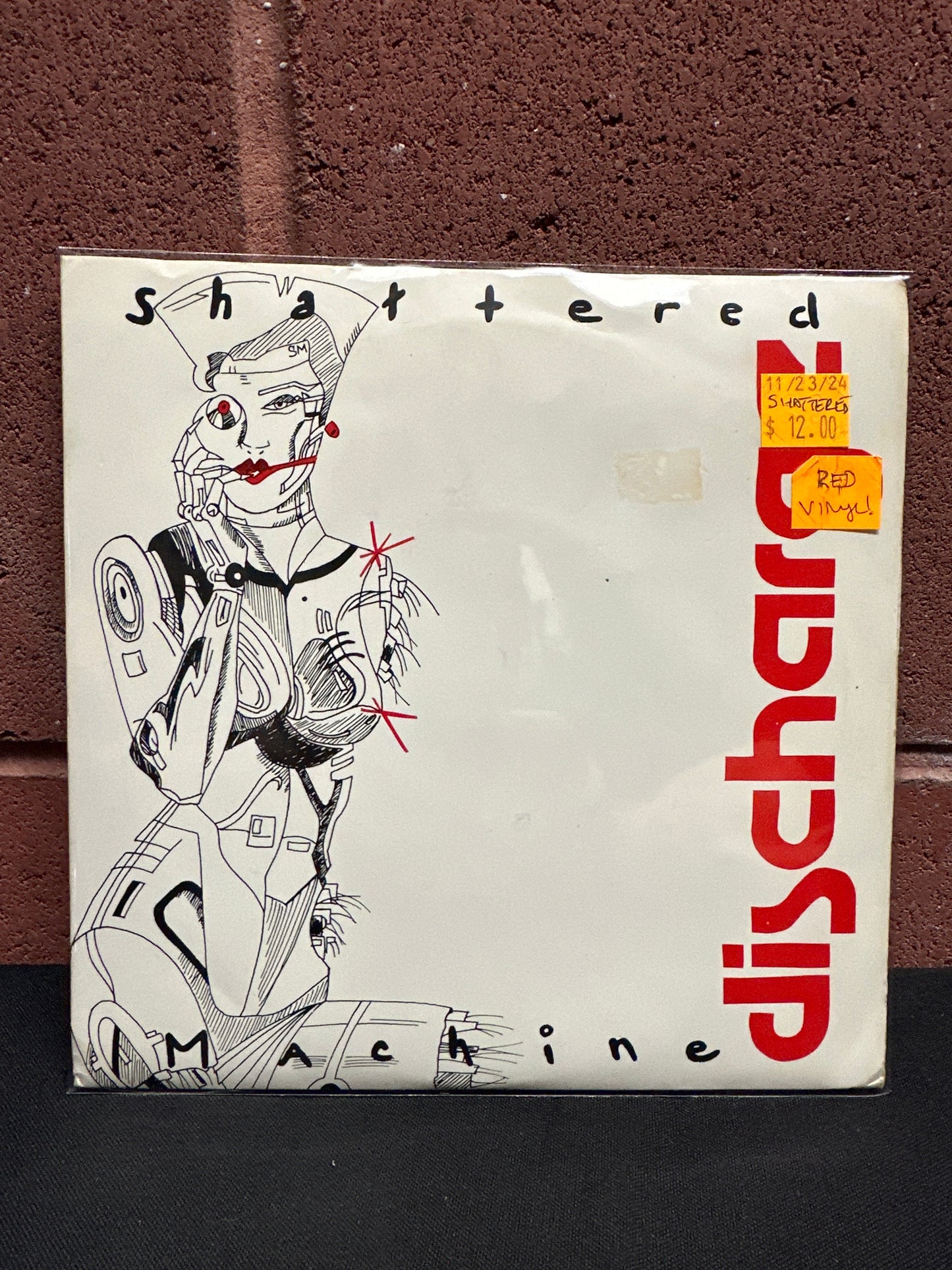 Used Vinyl: Shattered Machine "Discharge" 7" (Red Vinyl)