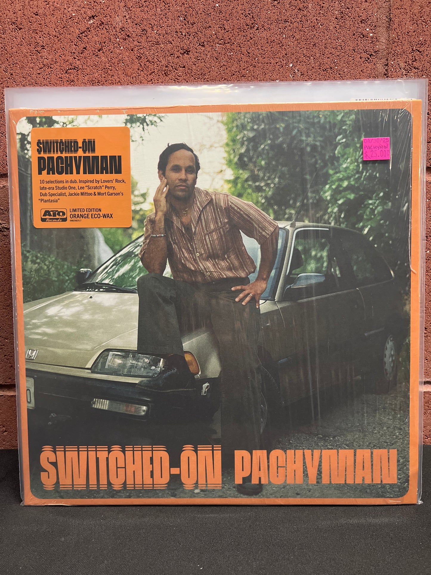 Used Vinyl: Pachyman "Switched On" LP (Dark Citrus "Eco-Mix" Vinyl)