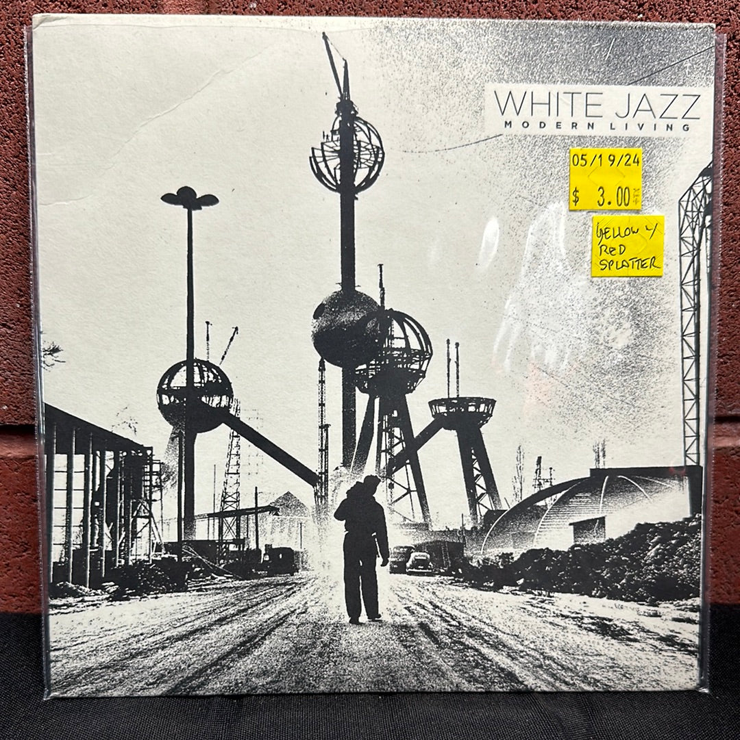Used Vinyl: White Jazz "Modern Living" 7" (Yellow with red splatter vinyl))