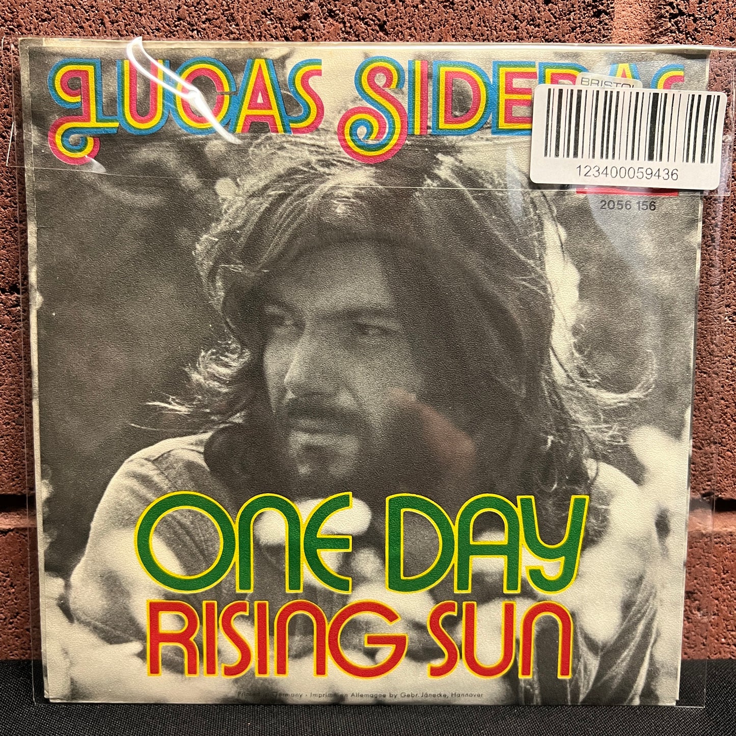 Used Vinyl: Lucas Sideras "One Day / Rising Sun" 7"
