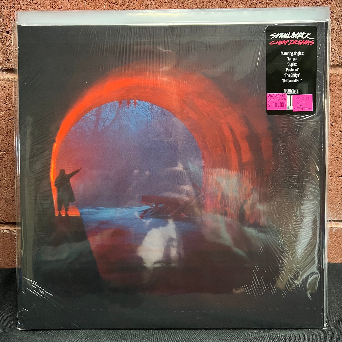 Used Vinyl: Small Black "Cheap Dreams" LP (Ice Blue with Red Splatter vinyl)