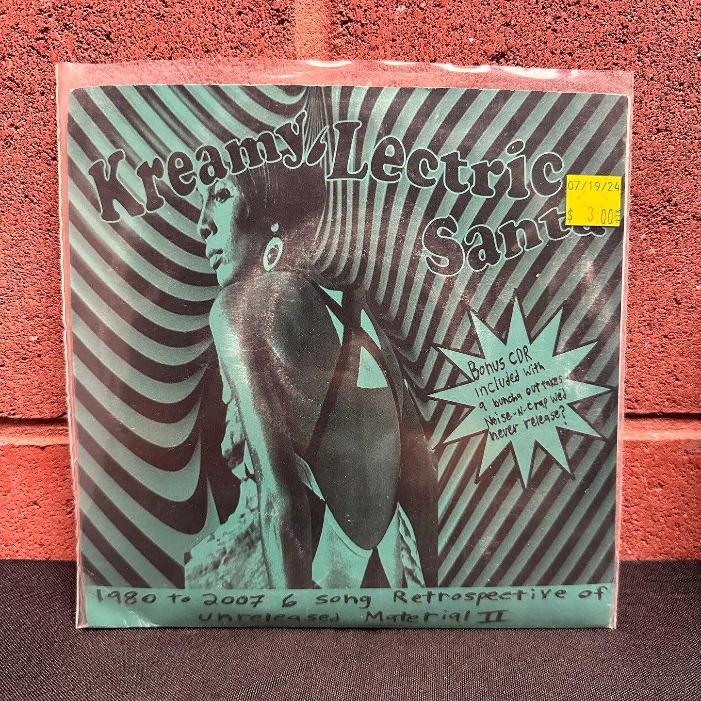 Used Vinyl: Kreamy 'Lectric Santa "1980 To 2007 6 Song Retrospective Of Unreleased Material Vol 2" 7" + CD