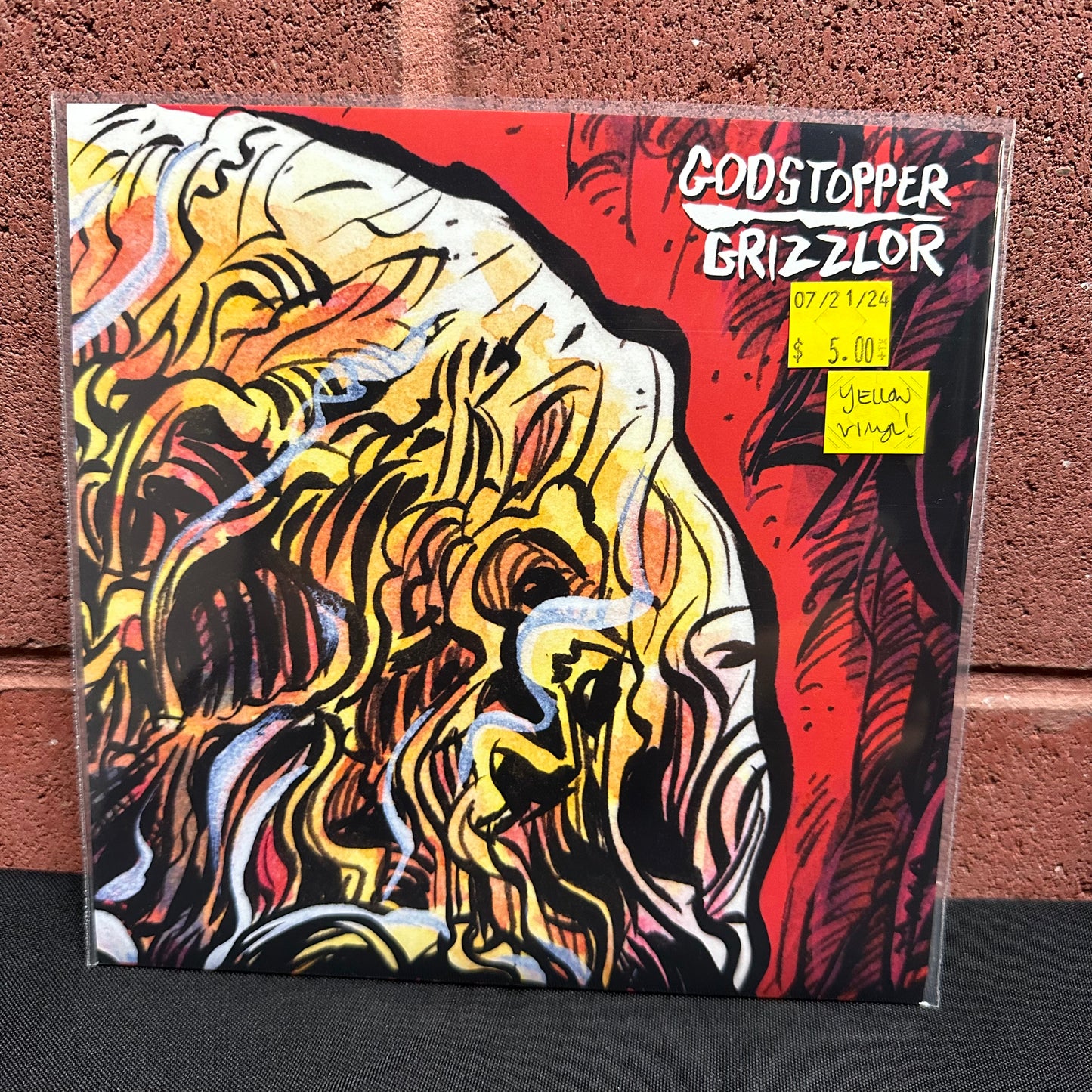 Used Vinyl: Grizzlor / Godstopper "Split 7"" 7" (Yellow vinyl)