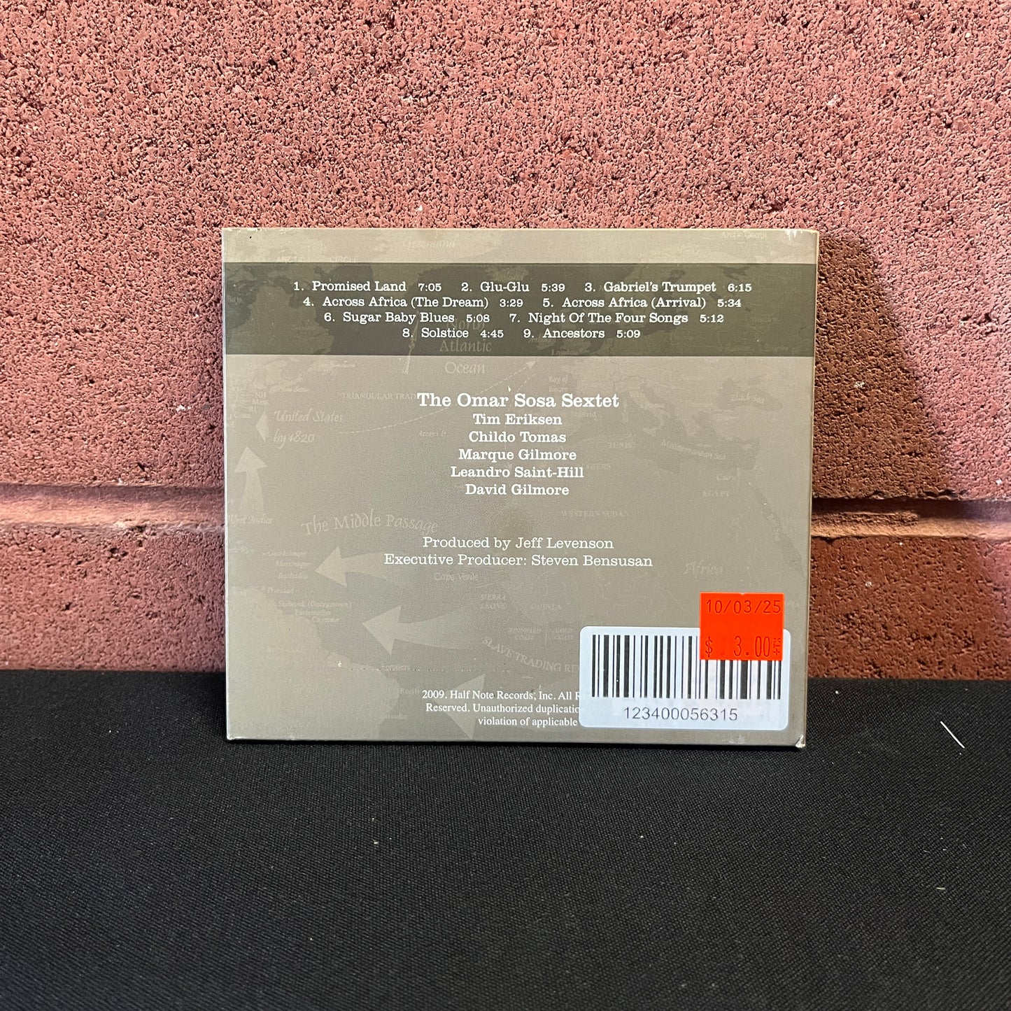 Used CD: Omar Sosa "Across The Divide: A Tale Of Rhythm & Ancestry" CD