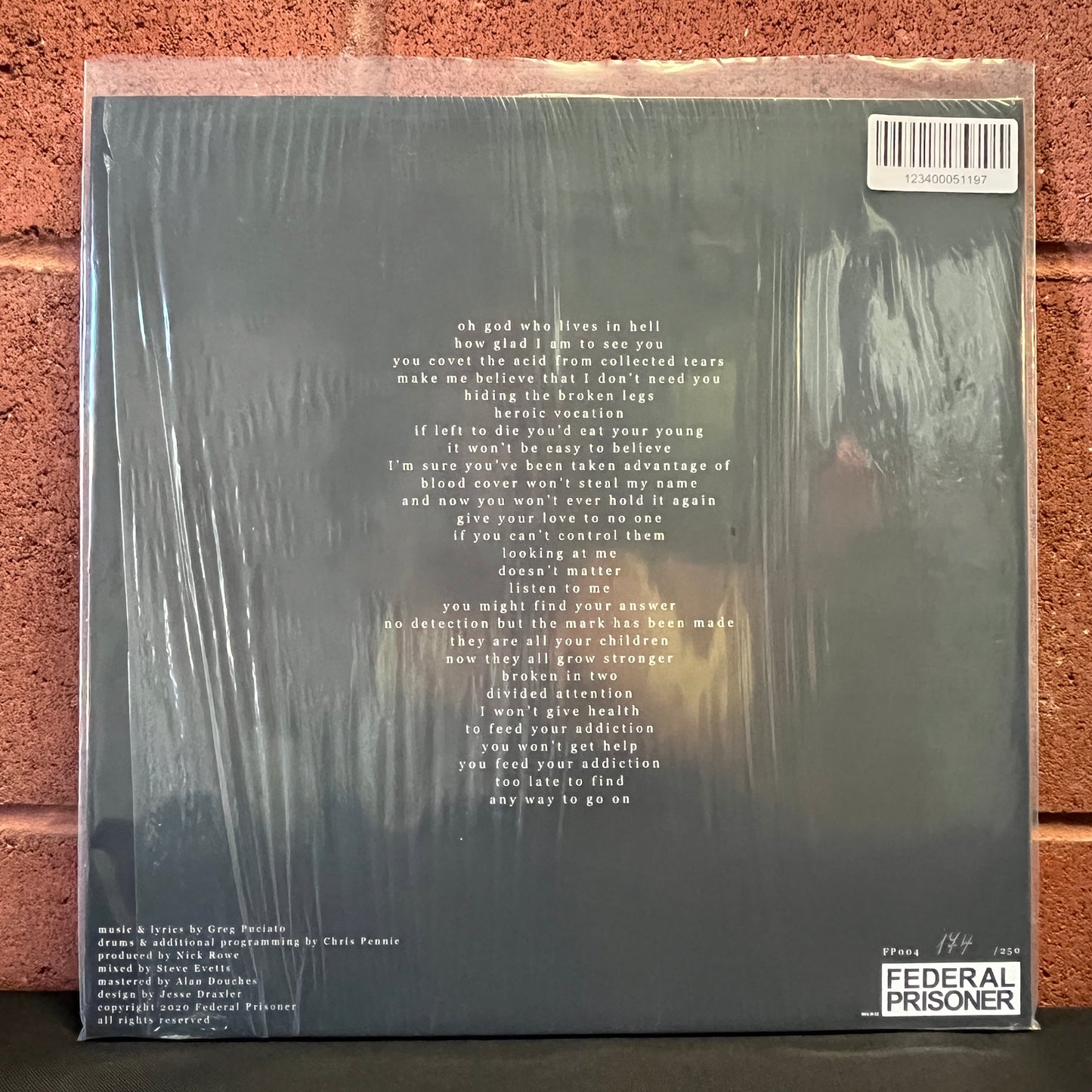 Used Vinyl: Greg Puciato "Fire For Water" 12" (Black Blob inside Blue Vinyl)