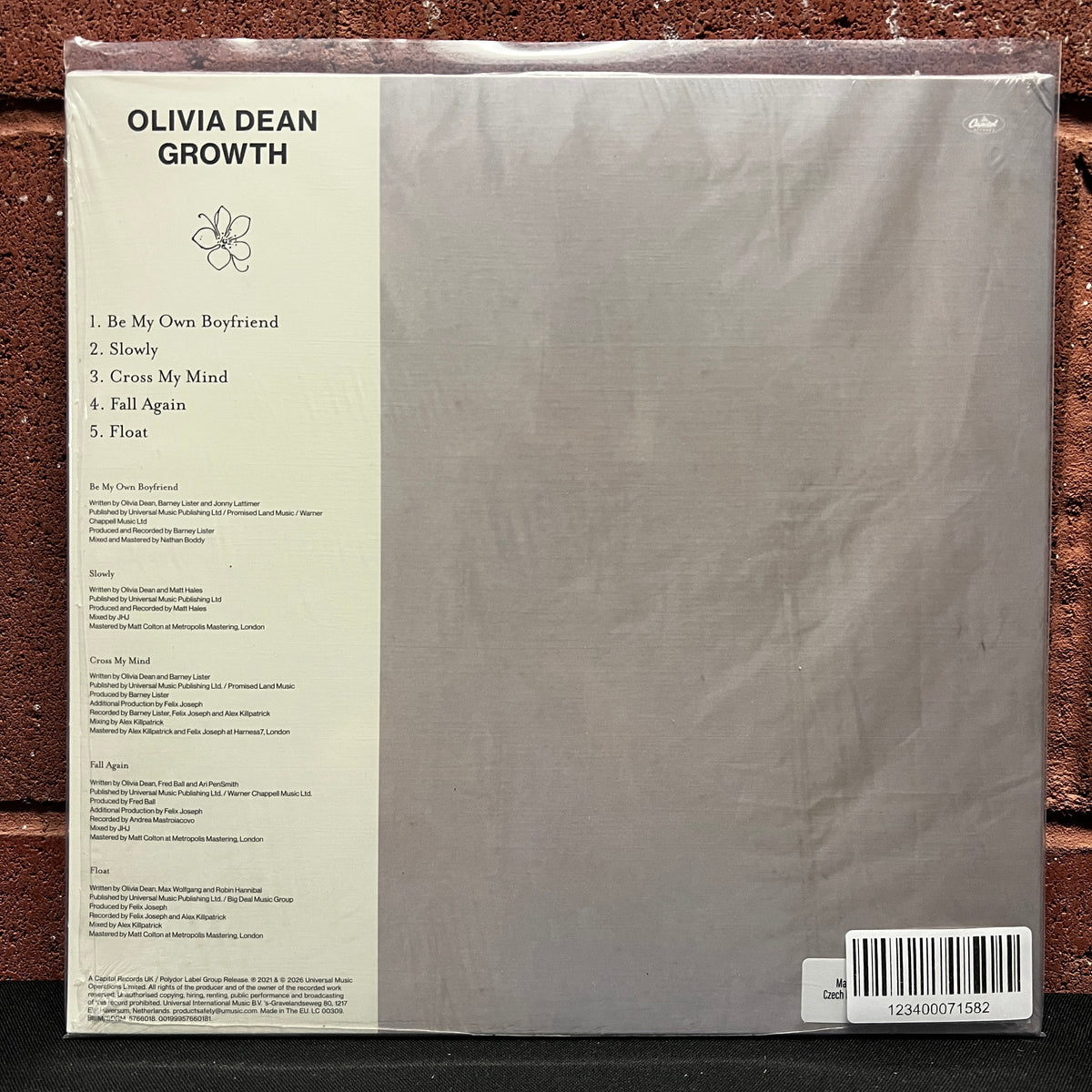 Used Vinyl: Olivia Dean "Growth" 10" (Pink Marble Vinyl)