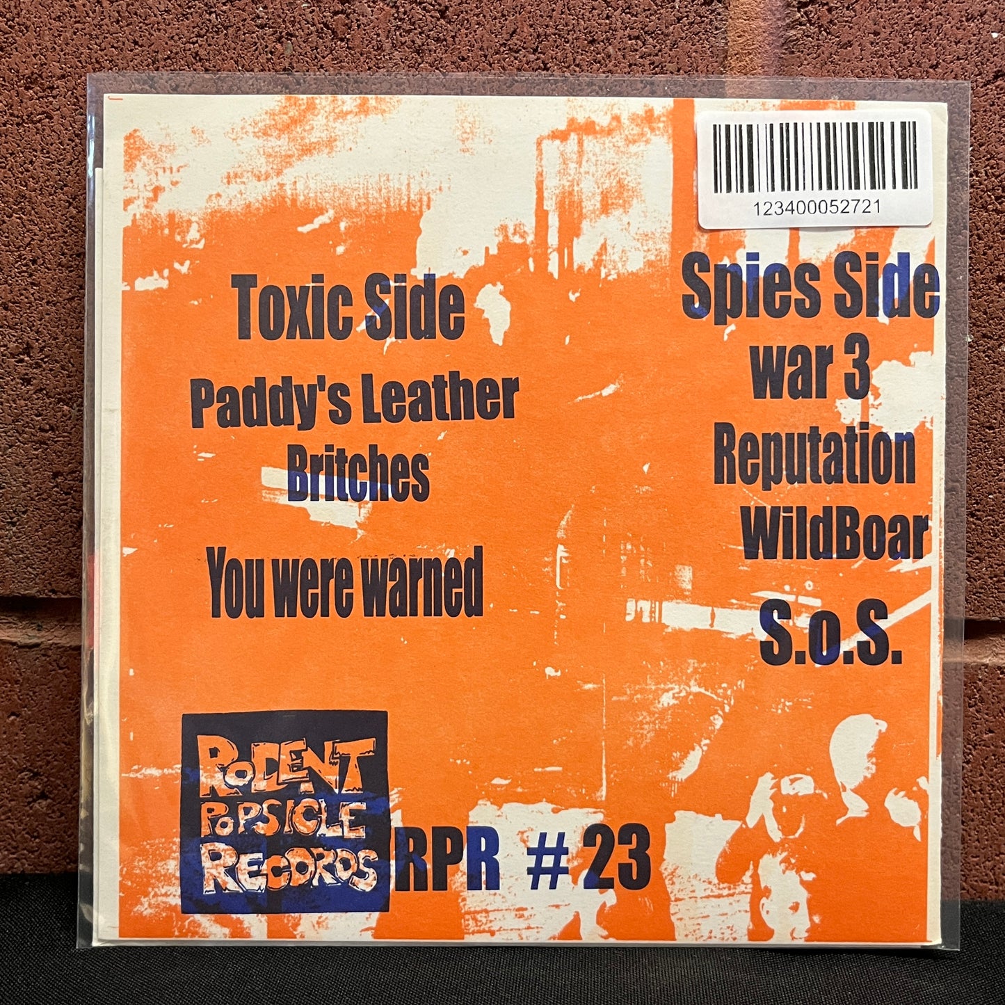 Used Vinyl: Toxic Narcotic / August Spies "Split" 7" (Red Vinyl)