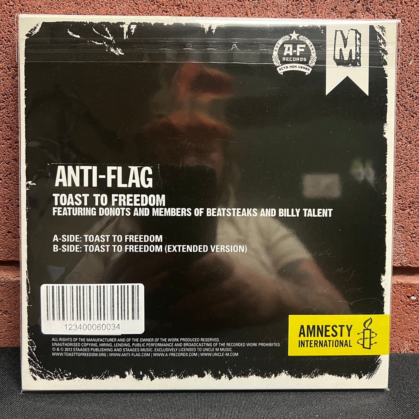 Used Vinyl: Anti-Flag "Toast To Freedom" 7" (Red vinyl)