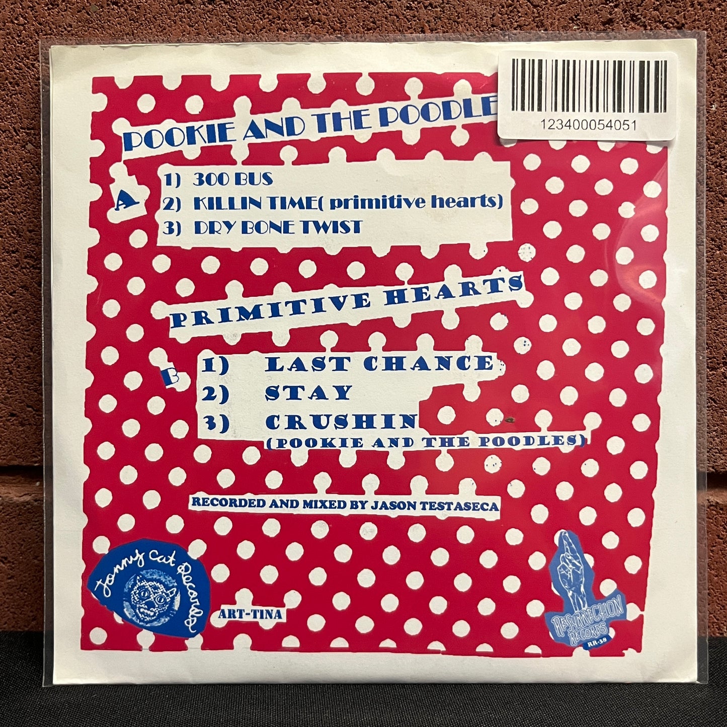 Used Vinyl: Pookie & The Poodles / Primitive Hearts "Split" 7" (Pink Vinyl)