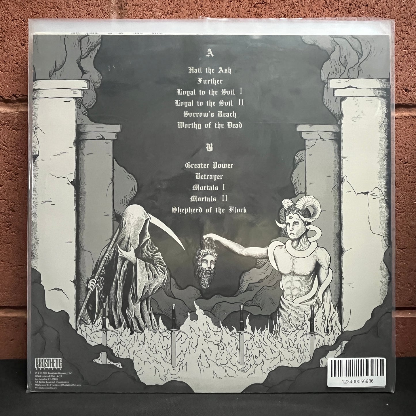 Used Vinyl: Wolf King "Loyal To The Soil" LP (Red w/Black Splatter Vinyl)