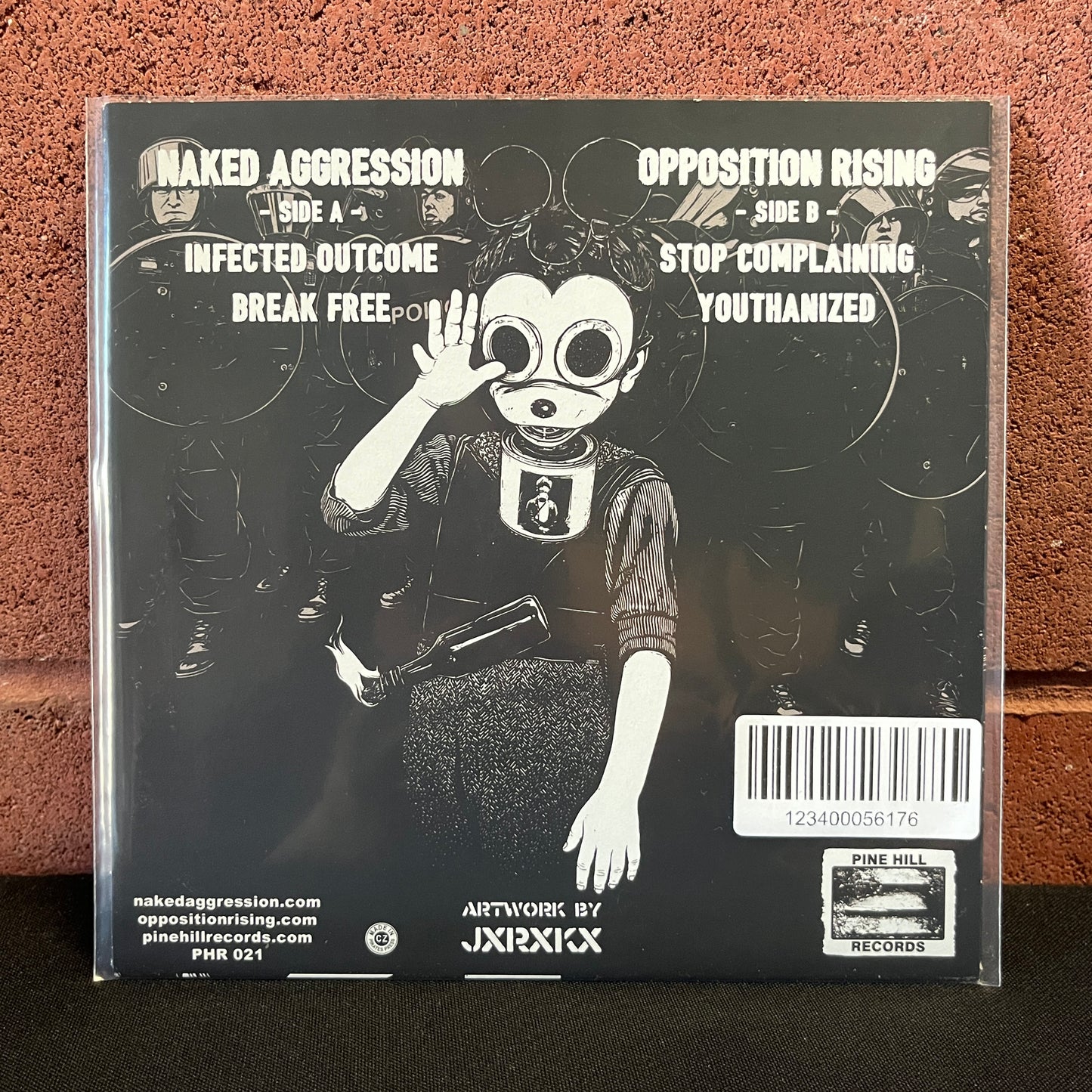 Used Vinyl: Naked Aggression / Opposition Rising "Split" 7" (Clear w/Red & Yellow Splatter Vinyl)