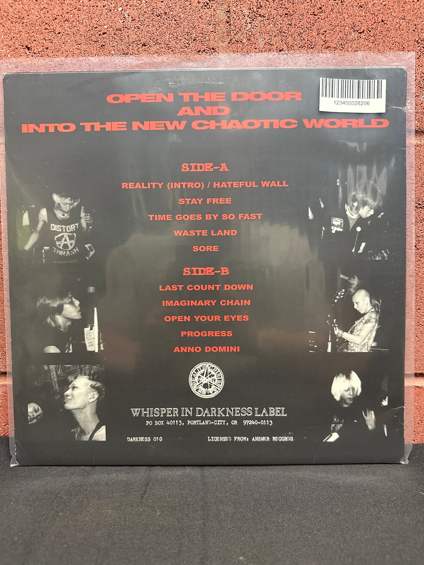 Used Vinyl:  Reality Crisis ”Open The Door And Into The New Chaotic World” 12"