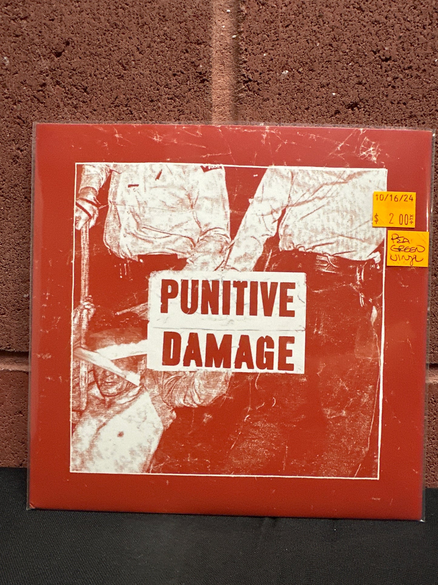 Used Vinyl:  Punitive Damage ”Strike Back” 7" (Pea Green Vinyl)