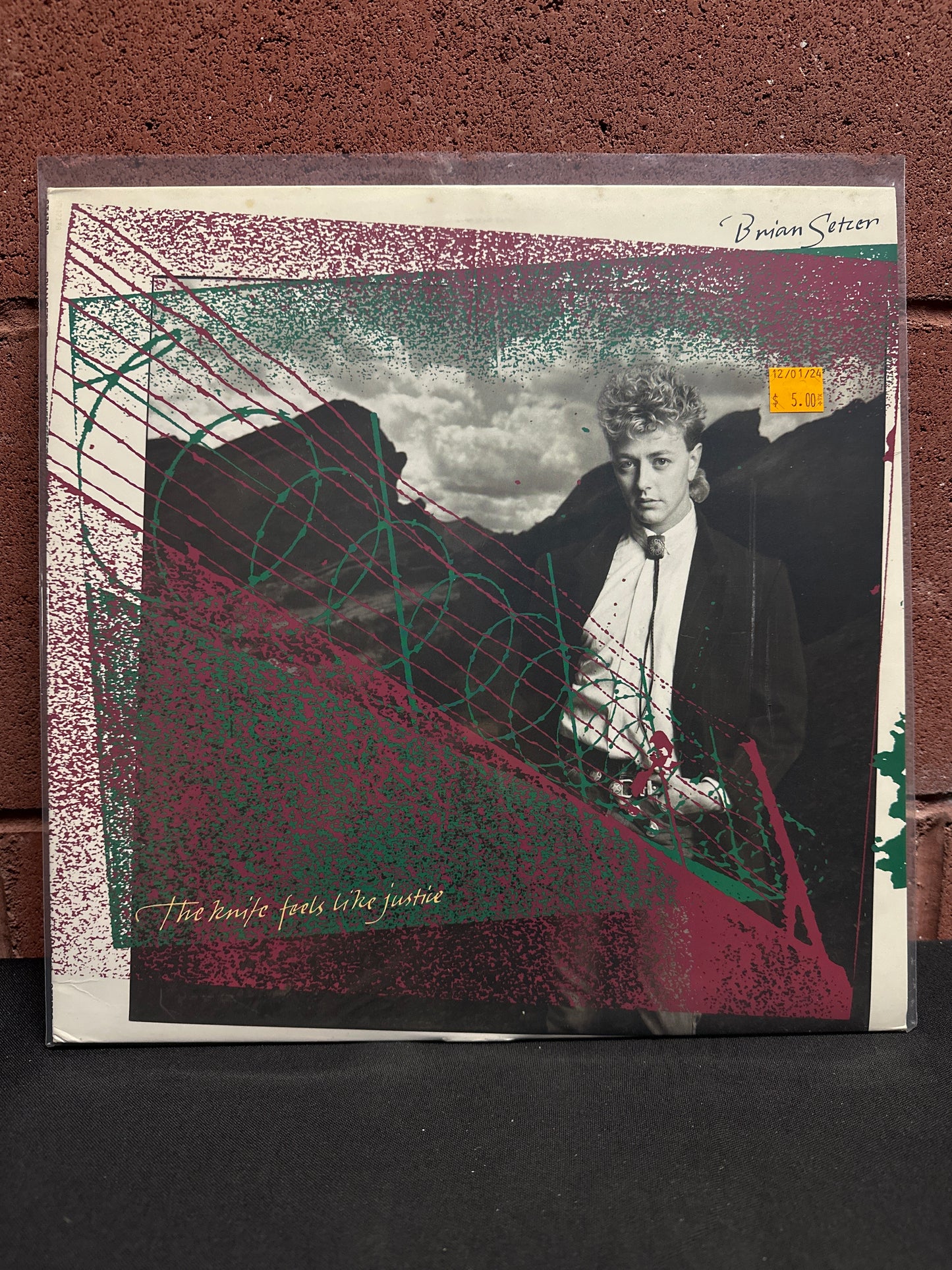 Used Vinyl:  Brian Setzer ”The Knife Feels Like Justice” LP