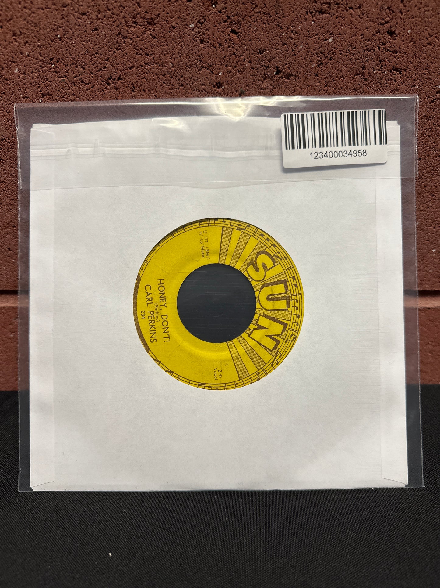 Used Vinyl:  Carl Perkins ”Blue Suede Shoes / Honey, Don't!” 7"