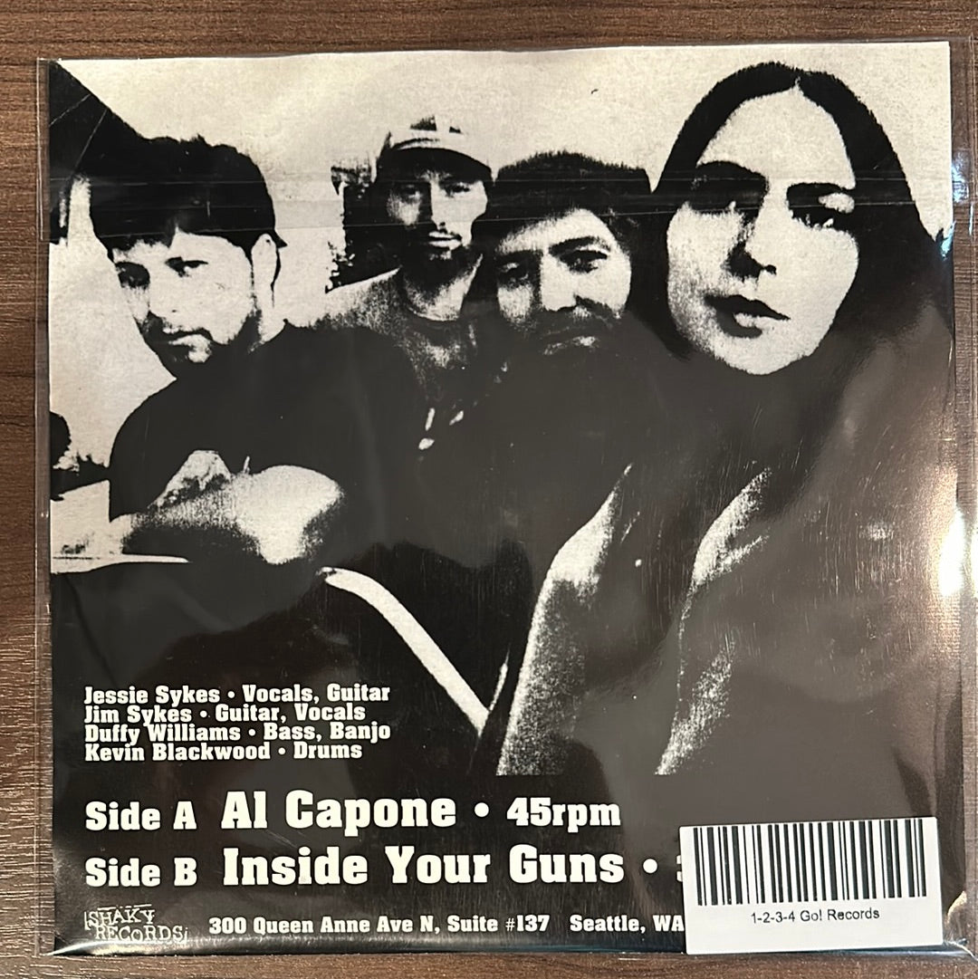 USED VINYL: Hominy “Al Capone / Inside Your Guns” 7"