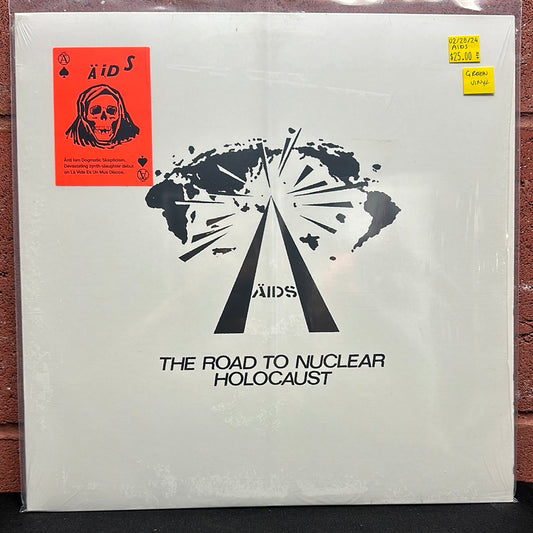 Used Vinyl:  A.I.D.S. ”The Road To Nuclear Holocaust” LP (Green vinyl)
