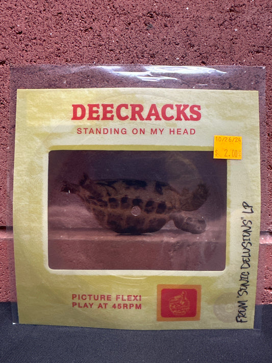 Used Vinyl:  DeeCracks ”Standing On My Head” 7" (Flexi)