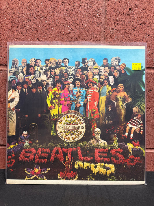 Used Vinyl:  The Beatles ”Sgt. Pepper's Lonely Hearts Club Band” LP