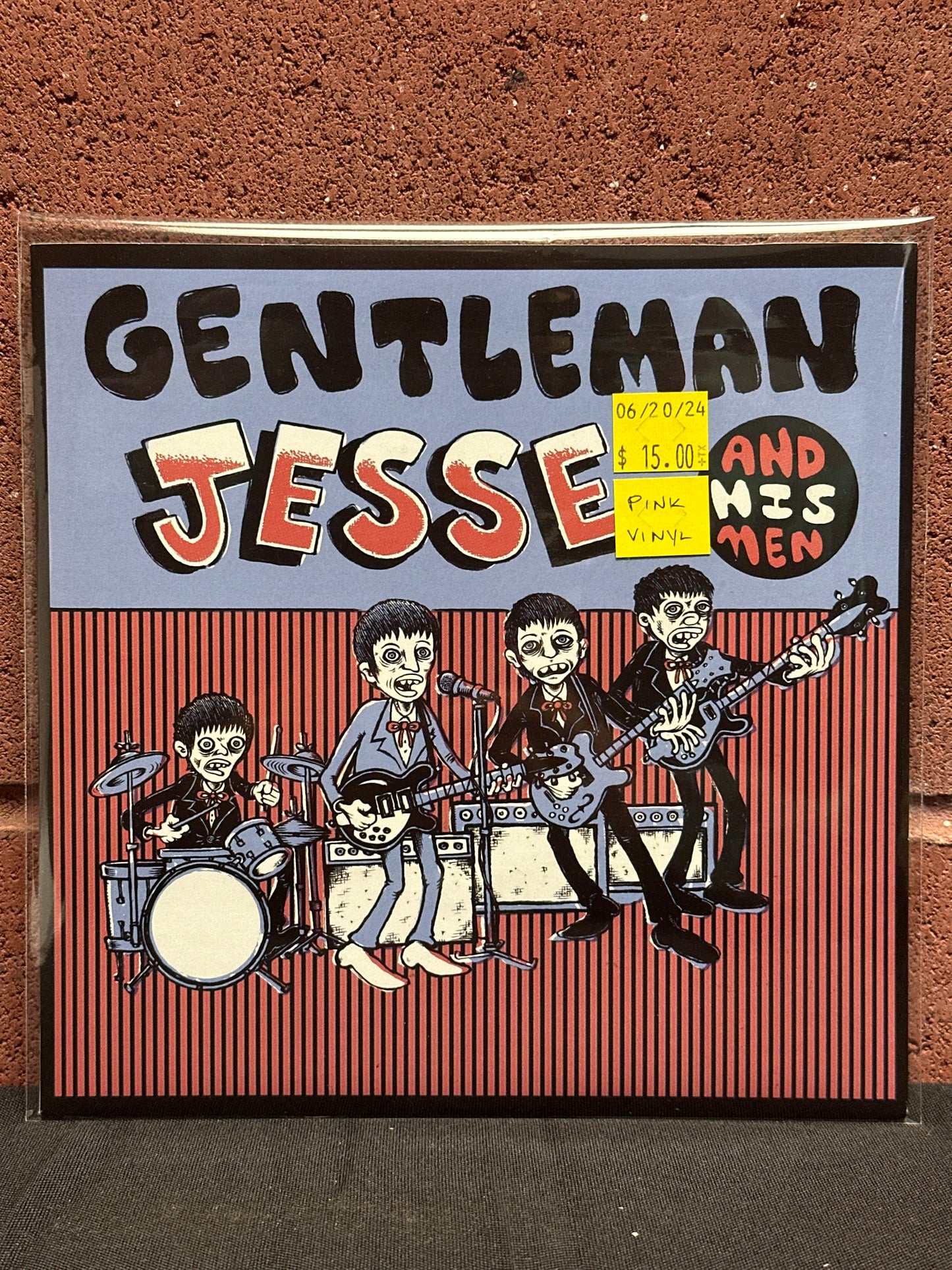 Used Vinyl:  Gentleman Jesse & His Men ”She's A Trap” 7" (Pink vinyl)