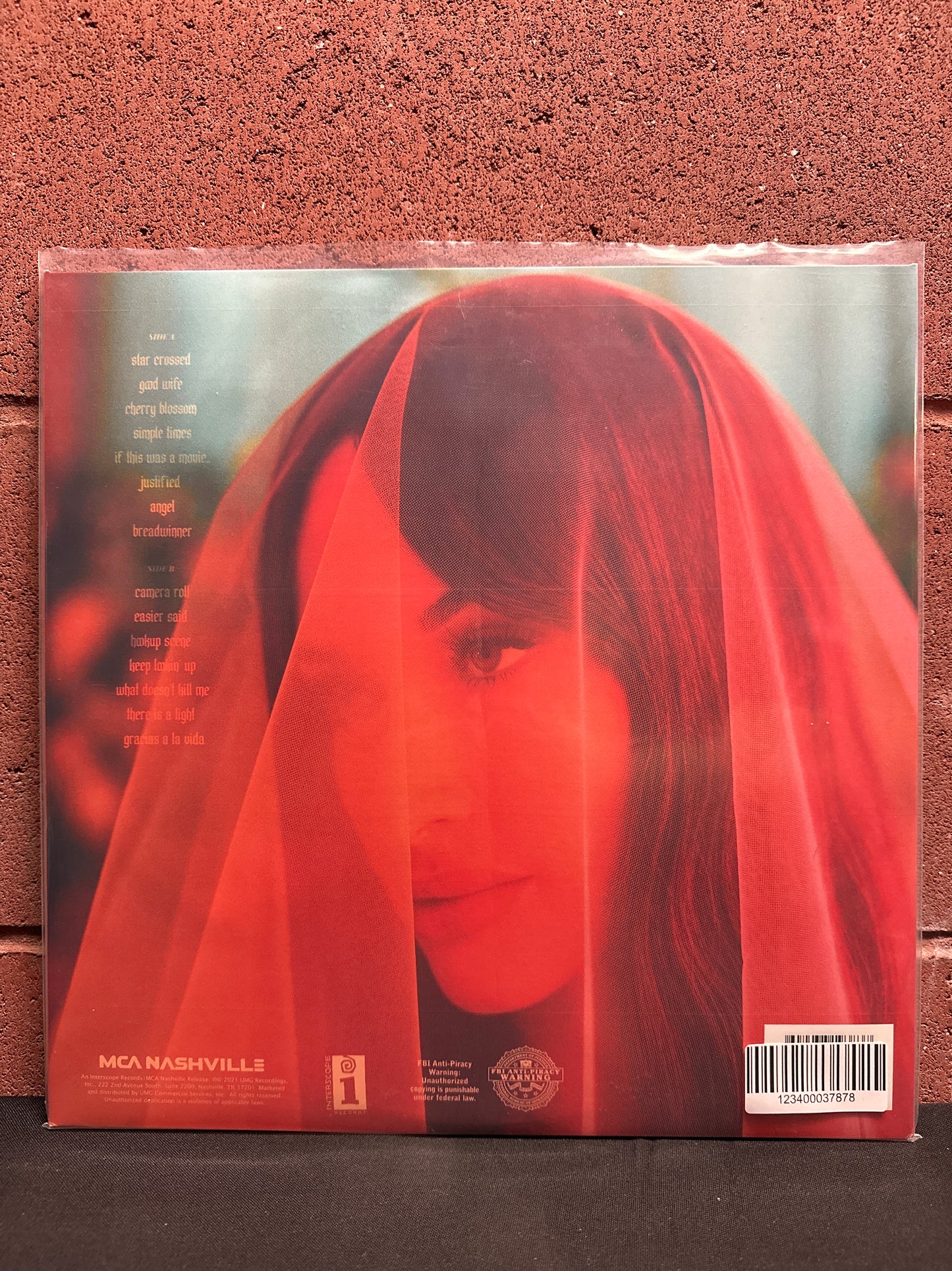 Used Vinyl:  Kacey Musgraves ”Star-Crossed” LP (Orange vinyl)