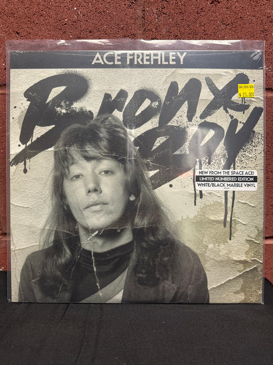 Used Vinyl:  Ace Frehley ”Bronx Boy” 12" (White/black marbled vinyl)