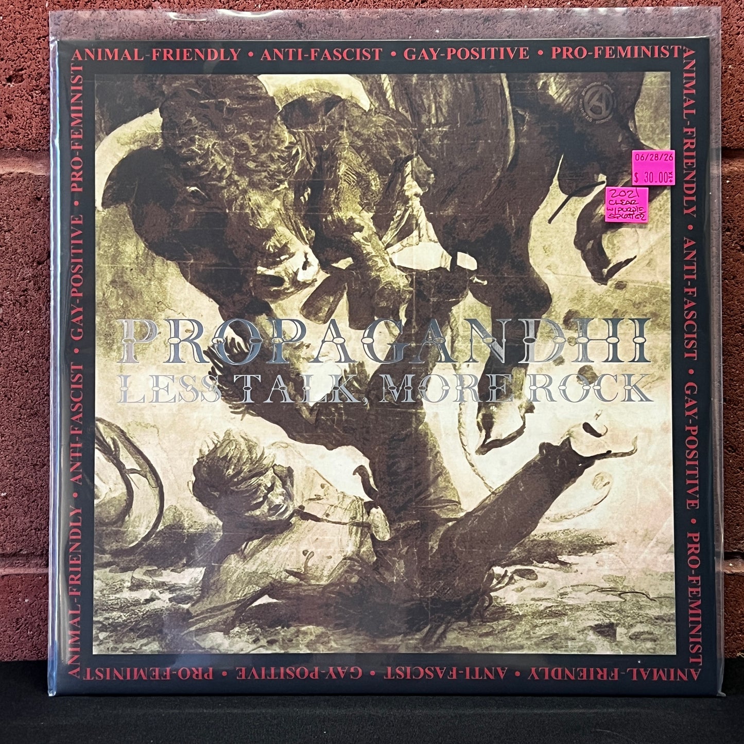 Used Vinyl: Propagandhi "Less Talk, More Rock" LP (2021 Press - Clear w/Purple Splatter Vinyl)