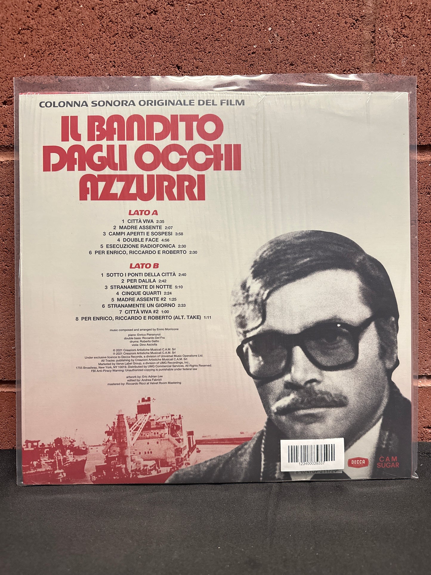 Used Vinyl:  Ennio Morricone ”(Colonna Sonora Originale Del Film) Il Bandito Dagli Occhi Azzurri” LP (Blue vinyl)