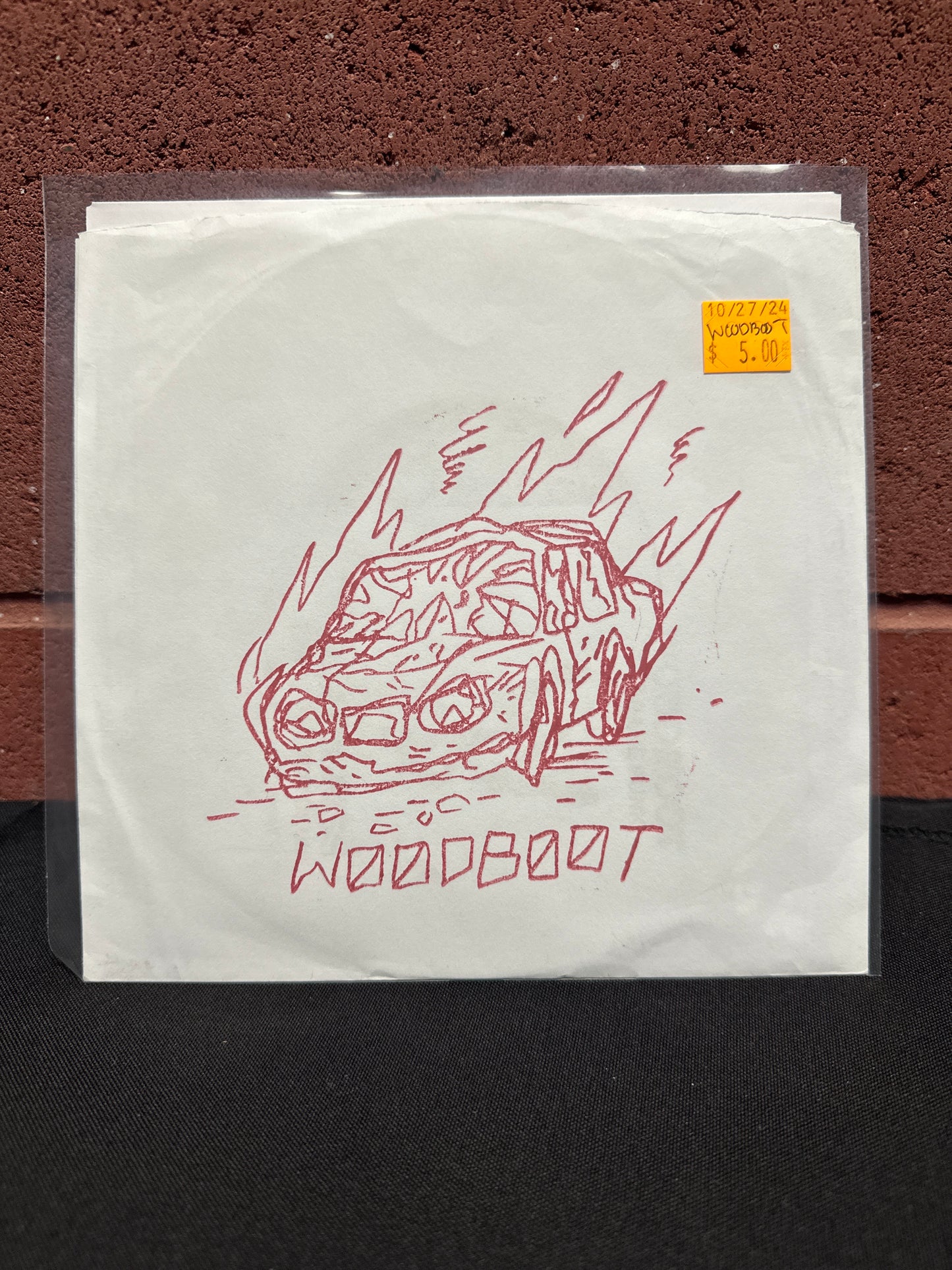 Used Vinyl:  Woodboot ”Black Piss / Into Your Skull” 7"