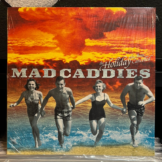 Used Vinyl:  Mad Caddies ”The Holiday Has Been Cancelled” 10" (Orange & Red Swirl)