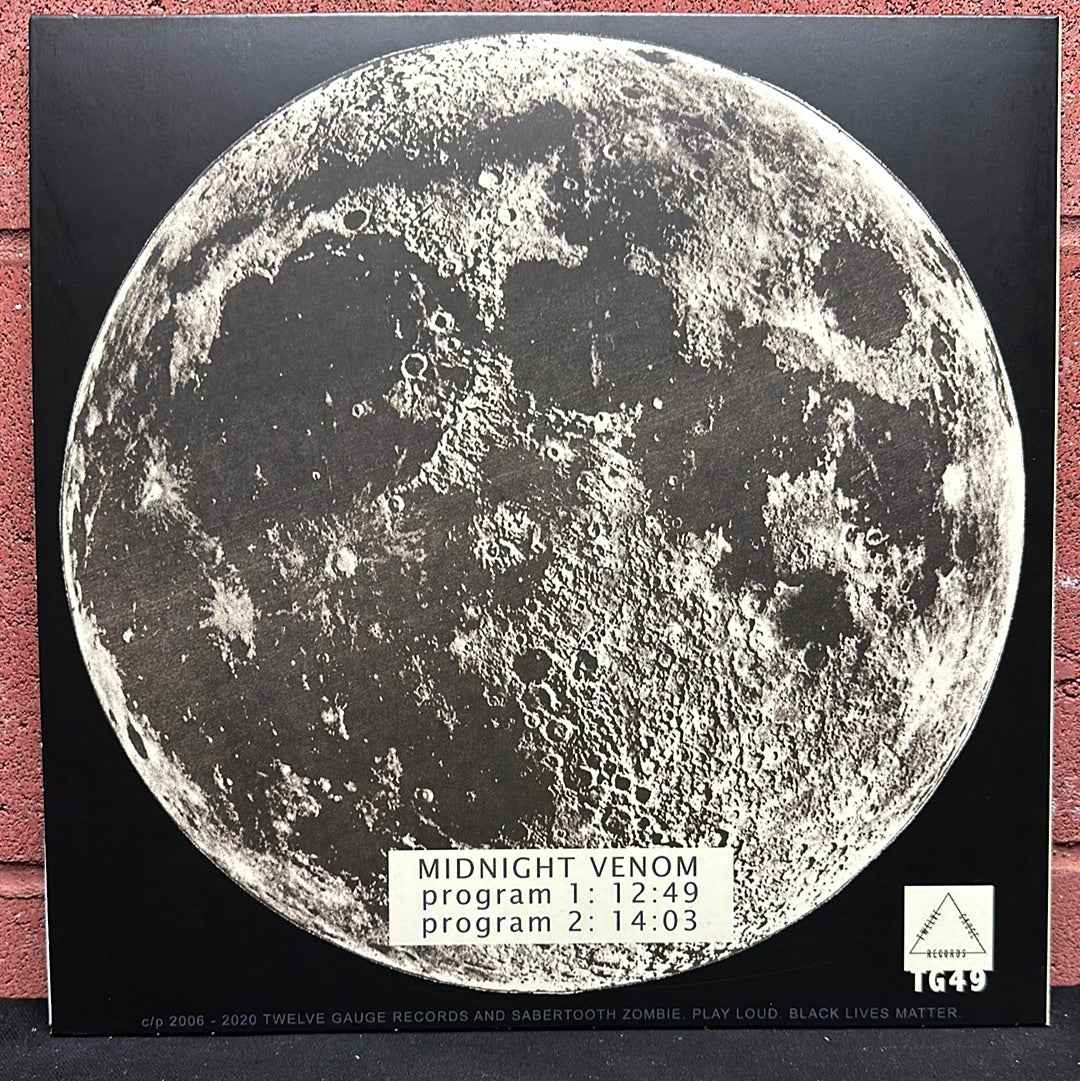 Used Vinyl:  Sabertooth Zombie ”Midnight Venom ” 12" (Clear vinyl)