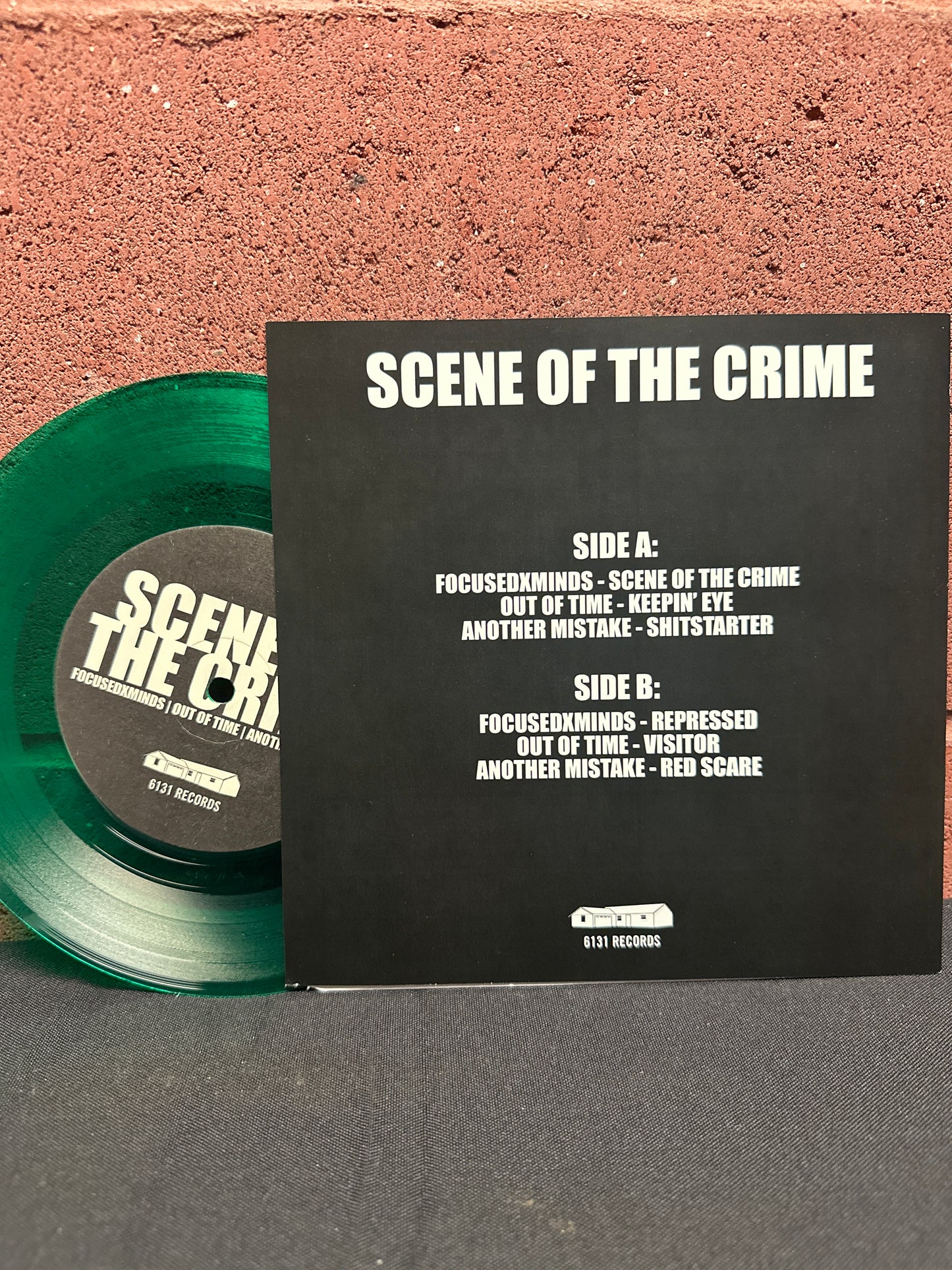 Used Vinyl:  FOCUSEDxMINDS / Out Of Time / Another Mistake ”Scene Of The Crime” 7" (Green vinyl)