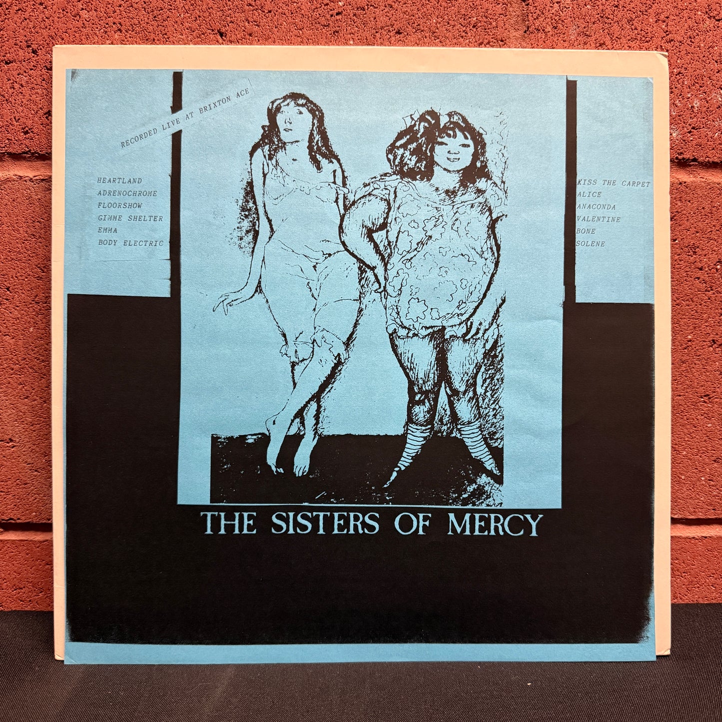 Used Vinyl: Sisters of Mercy "Recorded Live At Brixton Ace" LP (1984 Italian Multi-color vinyl edition)