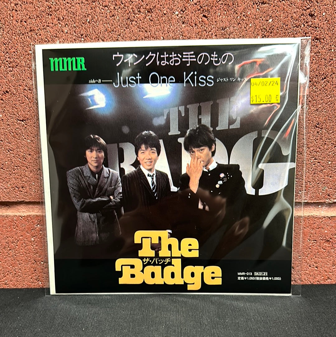 Used Vinyl:  The Badge "A wink is in your hands" 7" (Japanese Press)