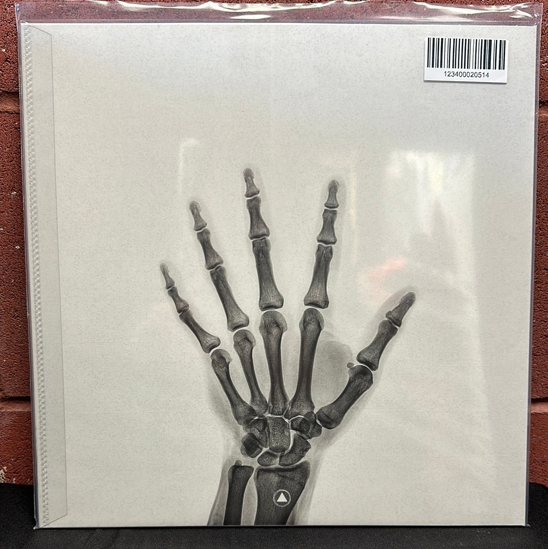 Used Vinyl:  John Carpenter ”Skeleton” 12" (Clear with black splatter vinyl)