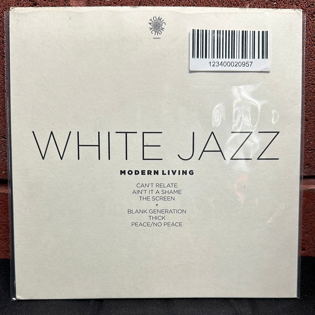 Used Vinyl:  White Jazz ”Modern Living” 7" (Yellow with red splatter vinyl))