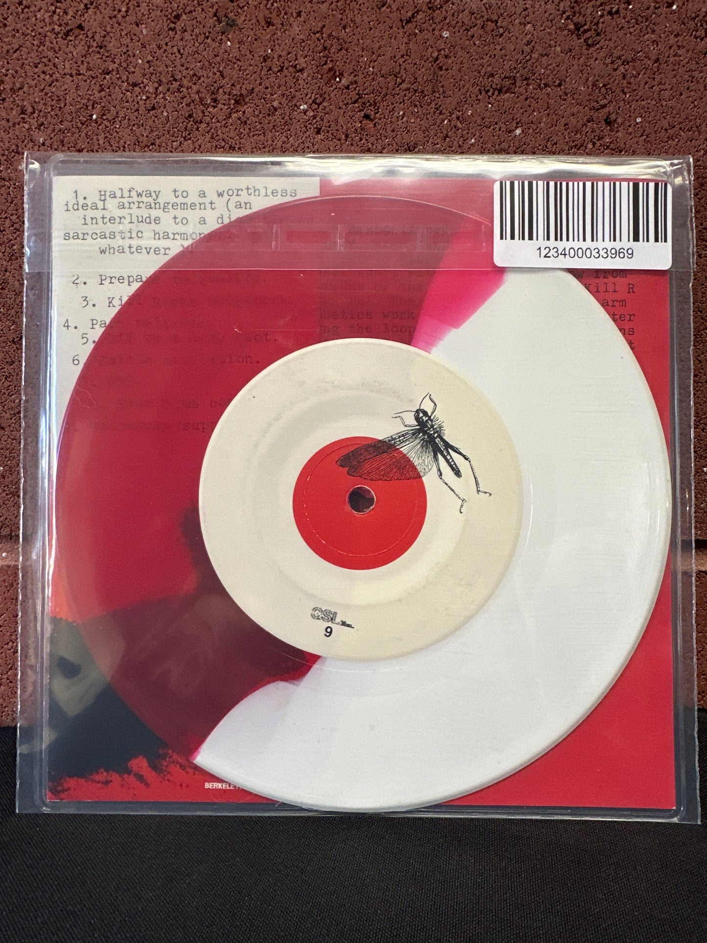 Used Vinyl:  The Locust ”Locust” 7" (Red & White Split Vinyl)