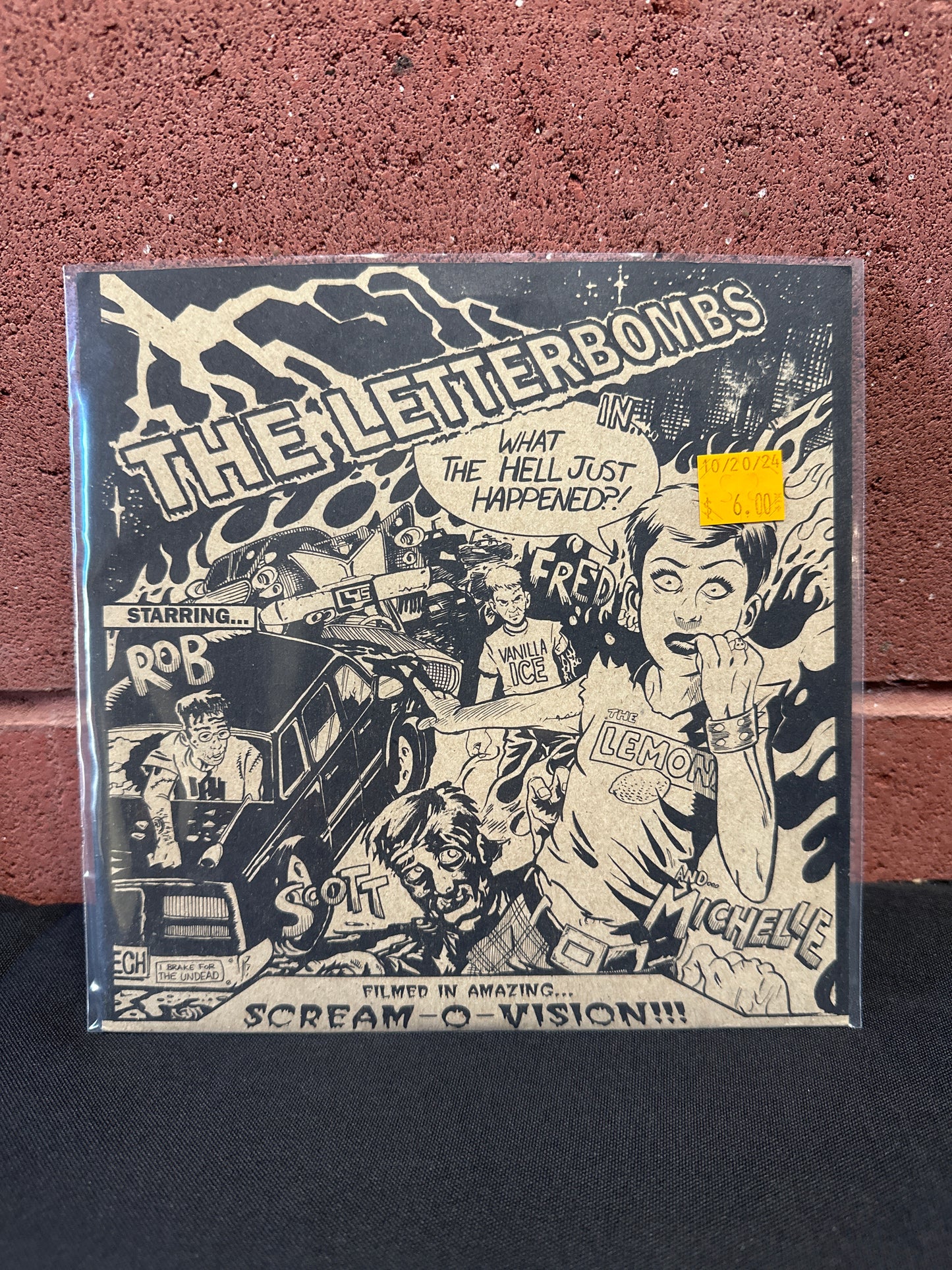 Used Vinyl:  The Letterbombs ”What The Hell Just Happened?!” 7"