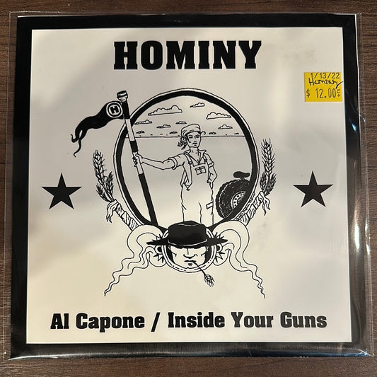 USED VINYL: Hominy “Al Capone / Inside Your Guns” 7"