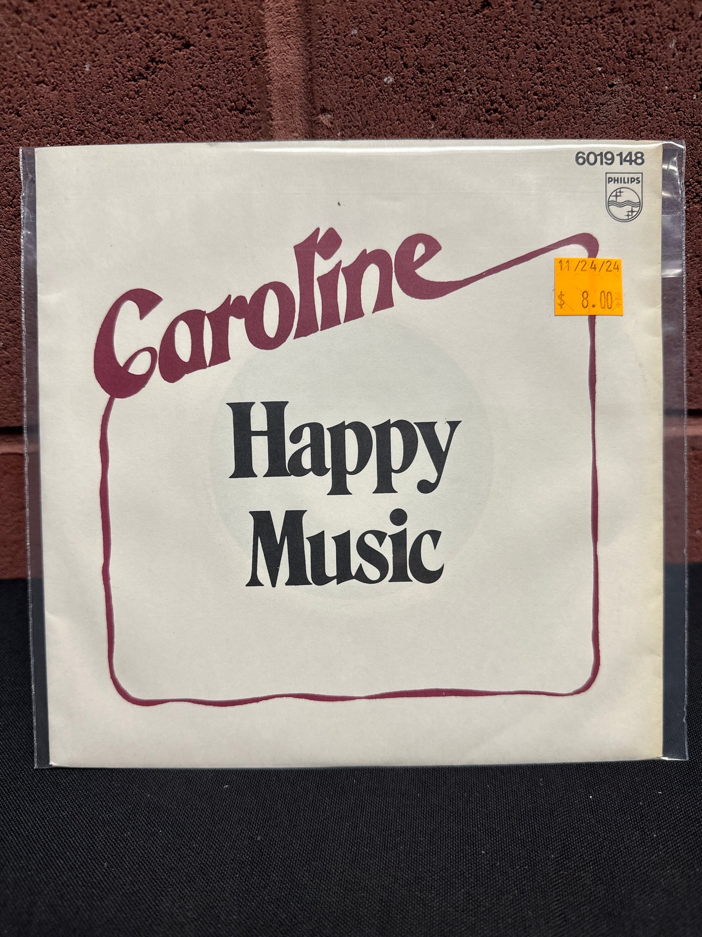 Used Vinyl:  Caroline ”Happy Music” 7"