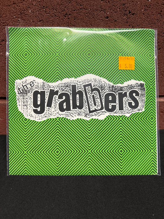 Used Vinyl:  The Grabbers ”Huntington Beach Vs. The World” 7"