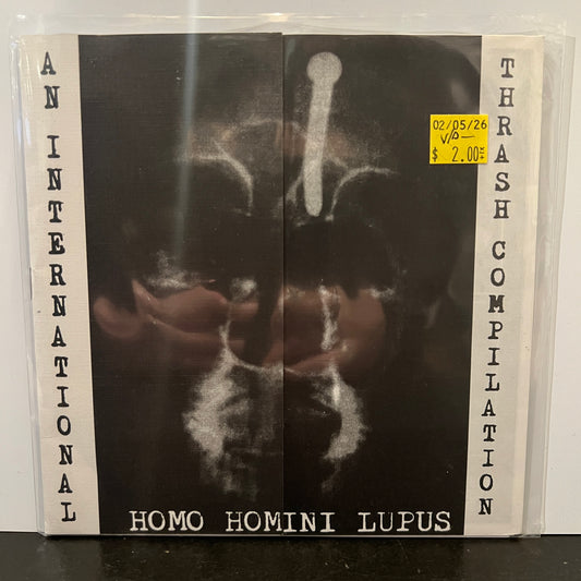 Used Vinyl: V/A - "Homo Homini Lupus" 7" (1998 Press)