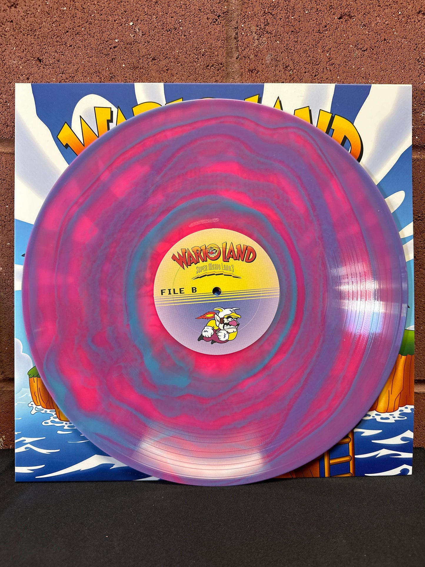 Used Vinyl:  Ryoji Yoshitomi, Kozue Ishikawa ”Wario Land: Super Mario Land 3” LP (Magenta & Blue Vinyl)